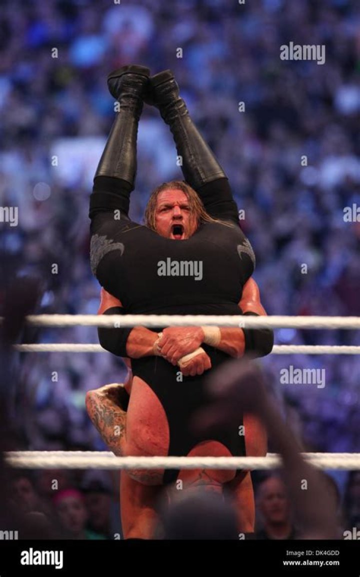 Has Triple H defeated Undertaker?