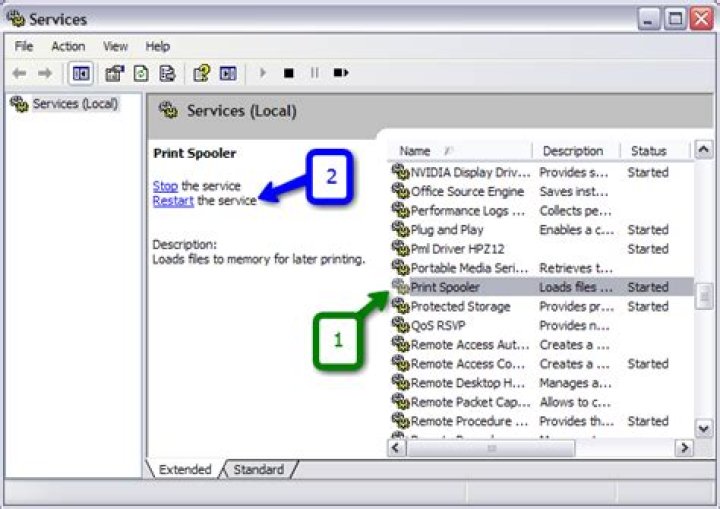How do I restart the print spooler in Windows 7?
