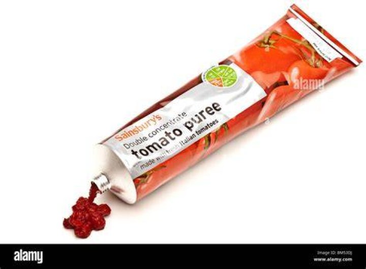 How many calories are in a tube of tomato puree?
