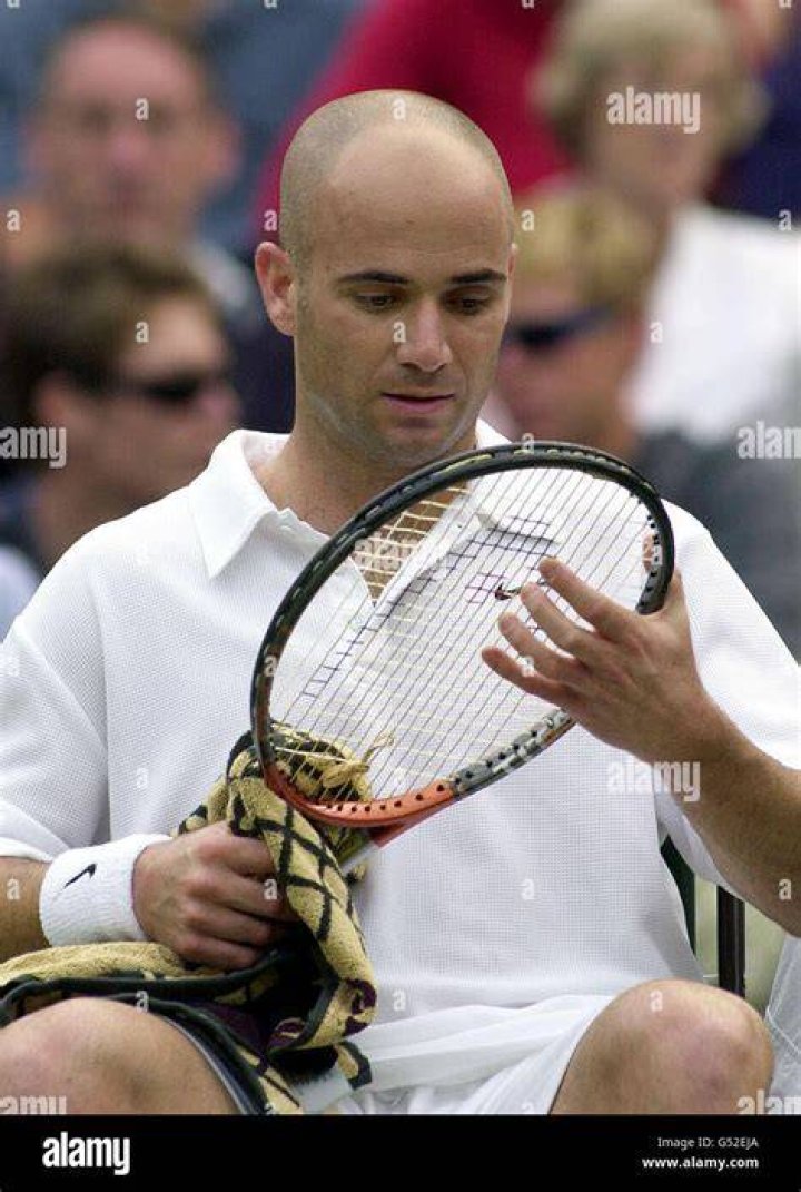What racket does Agassi use?