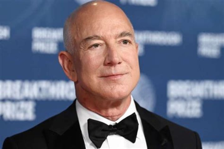 What was Jeff Bezos worth in 2014?